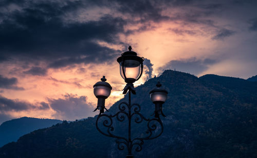 Street light against sky