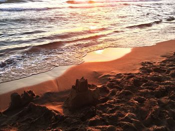 View of beach at sunset