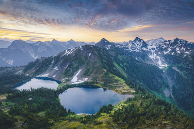 Scenic view of snowcapped mountains against sky during winter