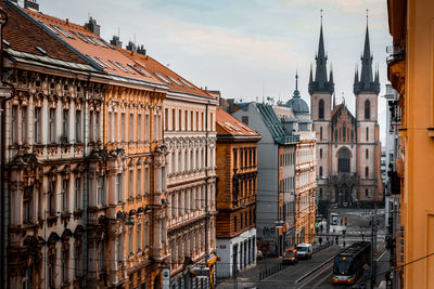 High angle view of old buildings against sky in city