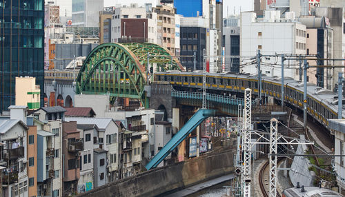 View of bridge and buildings in city