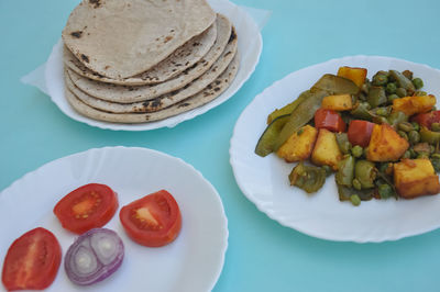 High angle view of breakfast served on table