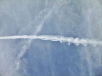 Low angle view of vapor trail in sky