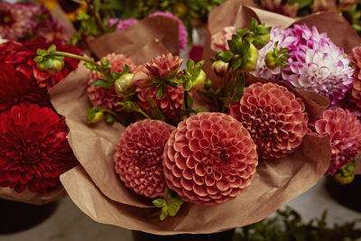 Bouquet of fresh dahlia flowers for sale at a farmers market in copley square, boston, massachusetts 