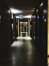 Illuminated corridor of building