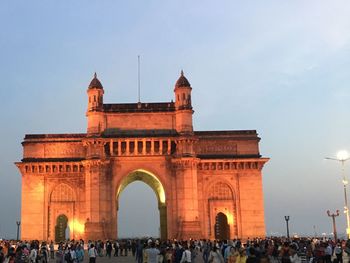 Gateway of india at mumbai with full of tourists during winter season.
