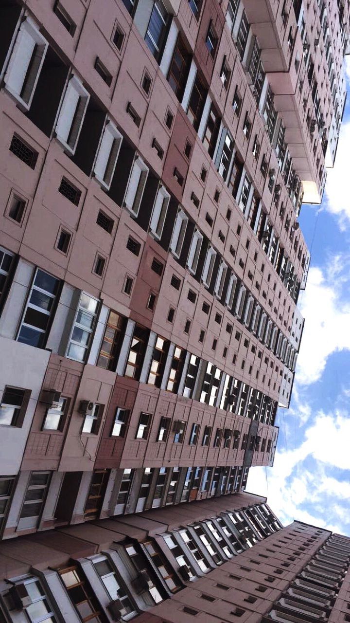 LOW ANGLE VIEW OF OFFICE BUILDING