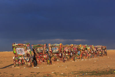 Garbage on beach against blue sky