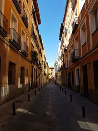 Street in city against clear sky