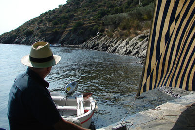 Rear view of woman looking at sea