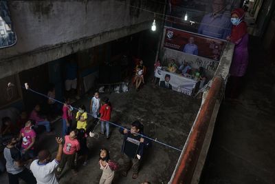 High angle view of people on street at night