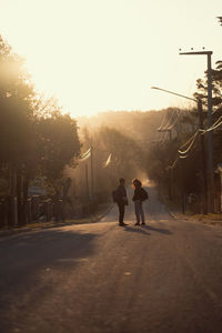 Friends walking in the street