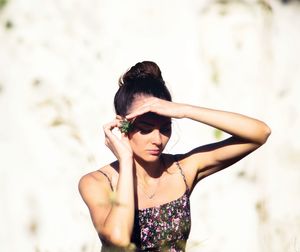 Young woman standing outdoors