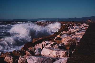 Scenic view of sea against clear sky
