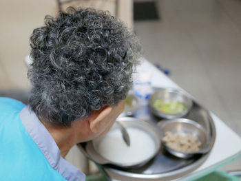 High angle view of patient having food