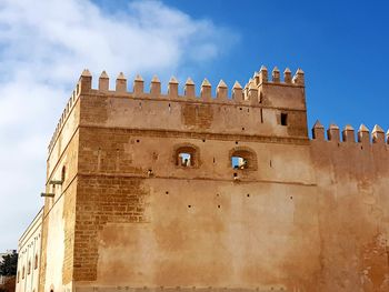 Low angle view of historical building against sky