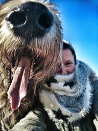 Close-up of woman with dog