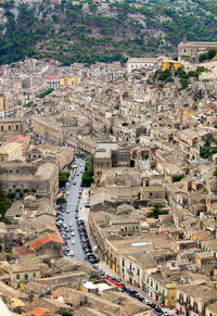 High angle view of street and buildings in city