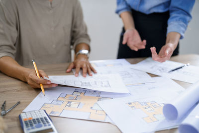 Midsection of man working at office