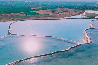 High angle view of swimming pool by lake