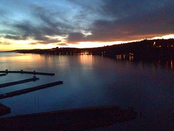 Scenic view of lake at sunset