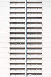 Full frame shot of balconies on residential building 