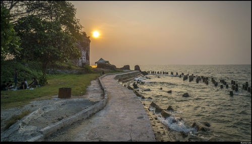 Scenic view of sea at sunset