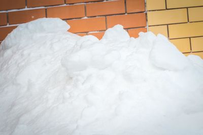 High angle view of ice cream against white wall