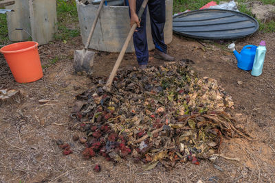 Low section of man working on field