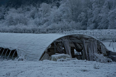 Snow covered built structure during winter