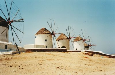 Traditional windmills against clear sky
