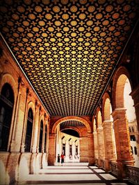 Low angle view of corridor of building