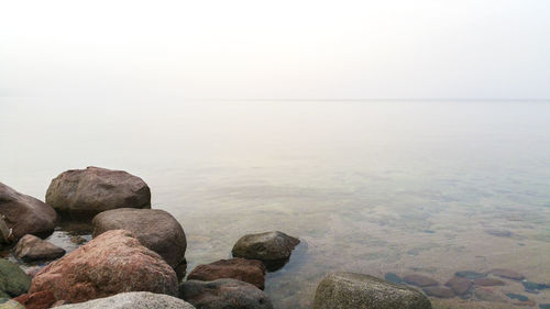 Scenic view of calm sea against sky