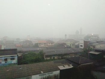 High angle view of buildings against sky