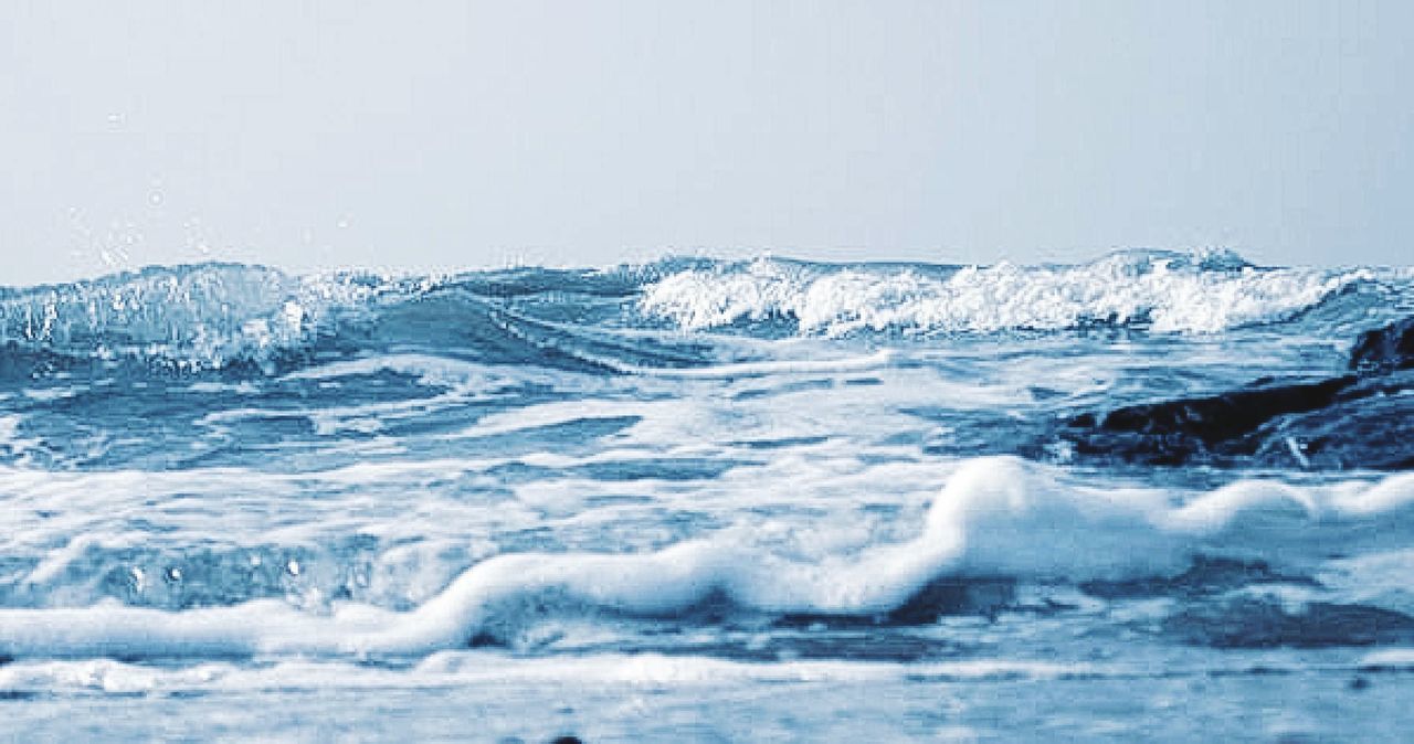 VIEW OF WAVES BREAKING