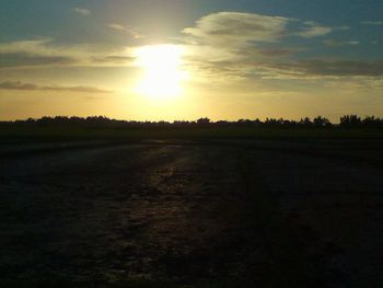 Scenic view of landscape at sunset