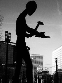 Woman standing in city