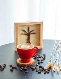 Close-up of coffee cup on table