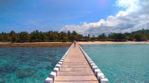 Scenic view of swimming pool against sky