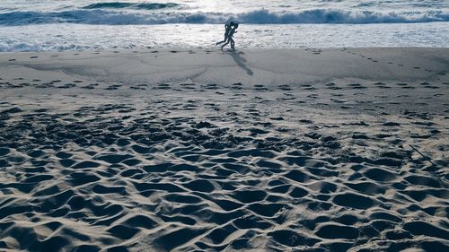 Full length of man on beach