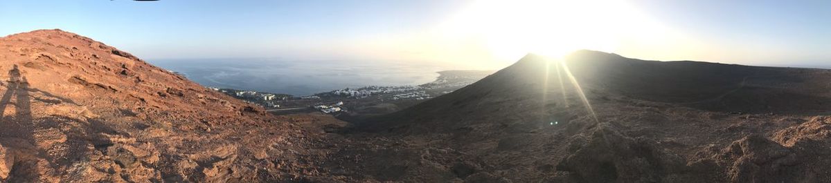 Panoramic view of mountains against sky