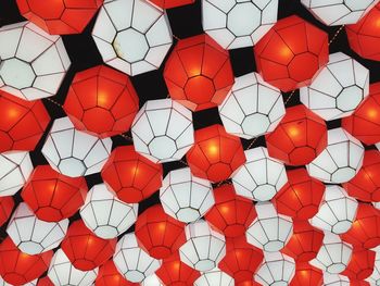 Full frame shot of illuminated lanterns hanging outdoors at night