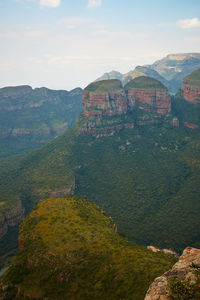 Scenic view of mountain range against sky