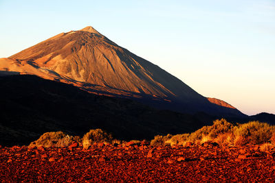 Rocky mountain at el teide national park against clear sky