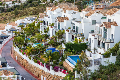 High angle view of townscape by trees