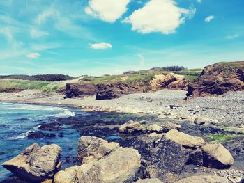 Scenic view of rocks against sky