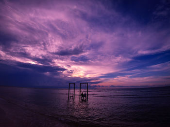 Scenic view of sea against sky at sunset