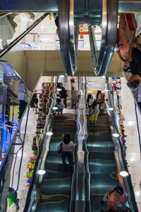 People walking on escalator