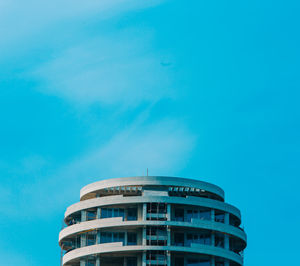 Low angle view of building against blue sky