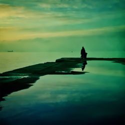 Scenic view of sea at sunset